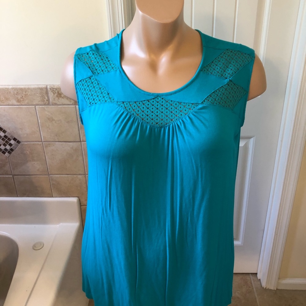 Teal sleeveless blouse